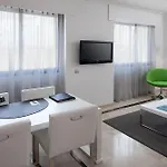 Nh Suites Prisma